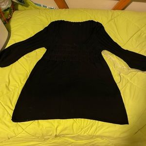 Ladies sweater.  Good condition.  Low cut in front, form fitting.